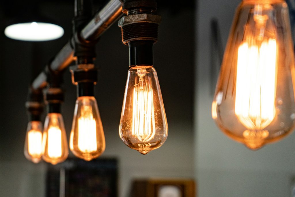 Pendant lights with filament bulbs glowing warmly